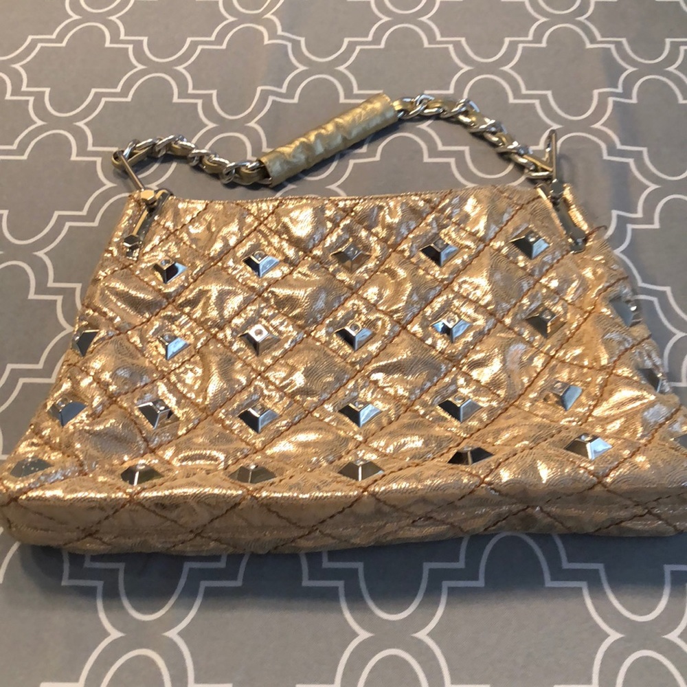 Used gold mirror purse